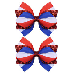 Miroksh front view of pair sparkly patriotic bows, festive finishing touch