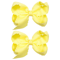 miroksh front view of lemon yellow bow pair highlighting bright color and polish