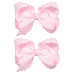 Miroksh front view pair showing pink scalloped grosgrain bows, polished look