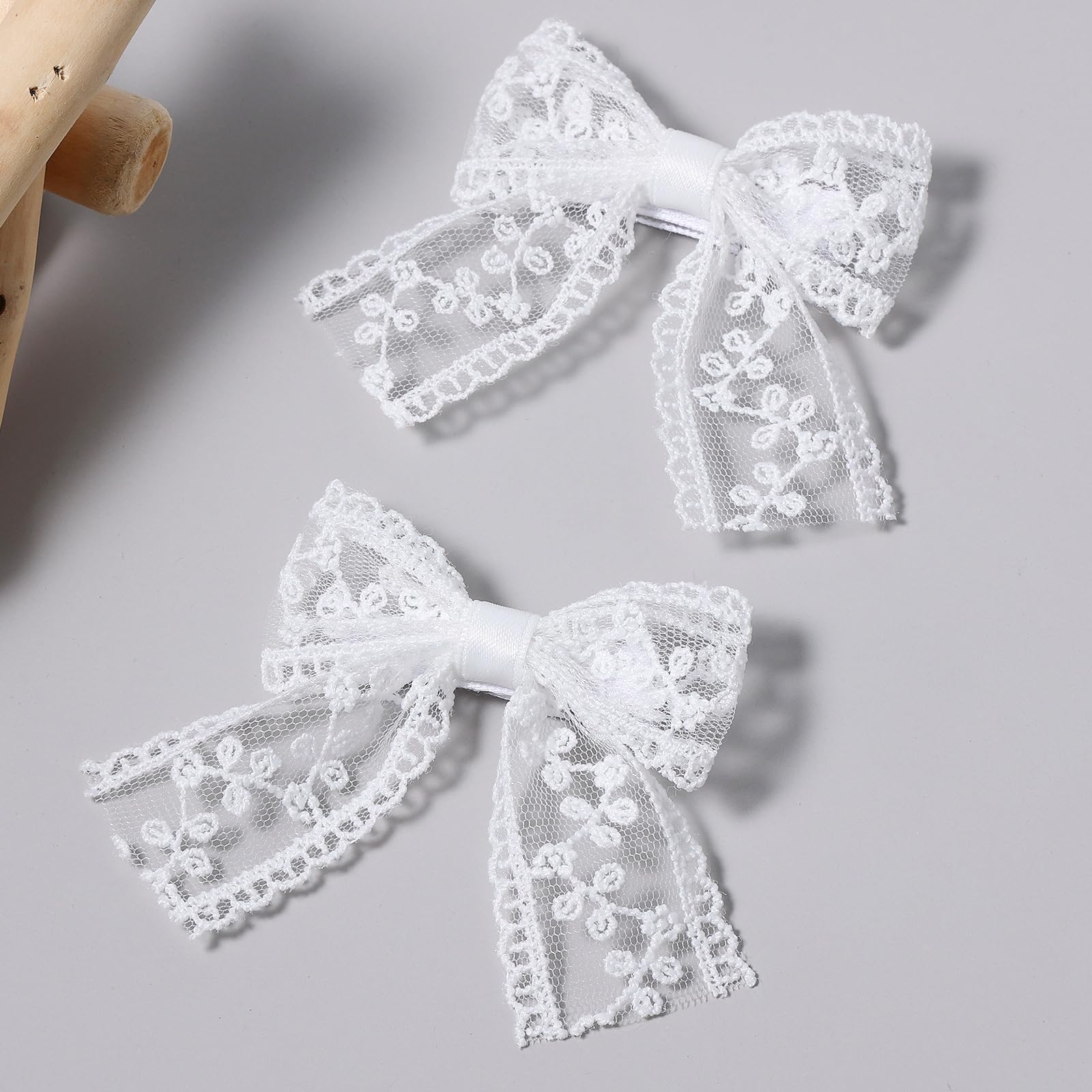 Miroksh front view white lace bow showing elegant shape and refined finish