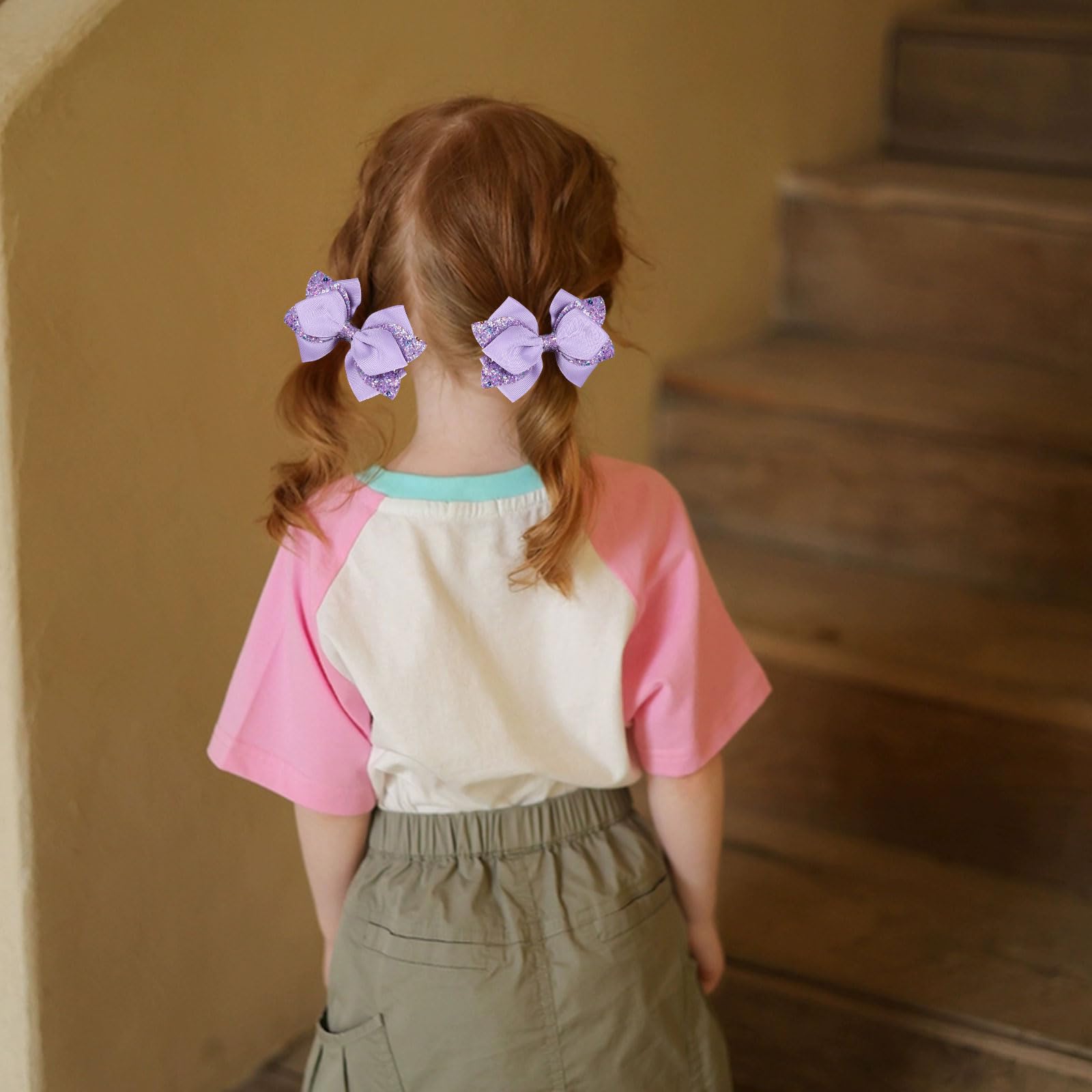 Miroksh bow clipped in ponytail demonstrating festive look and comfortable wear