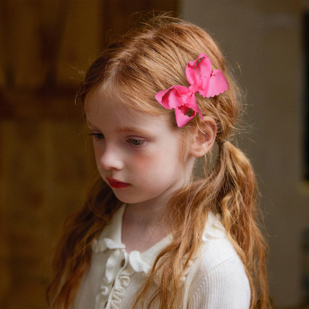 Miroksh bow clipped in child's hair showing comfortable fit and styling benefit