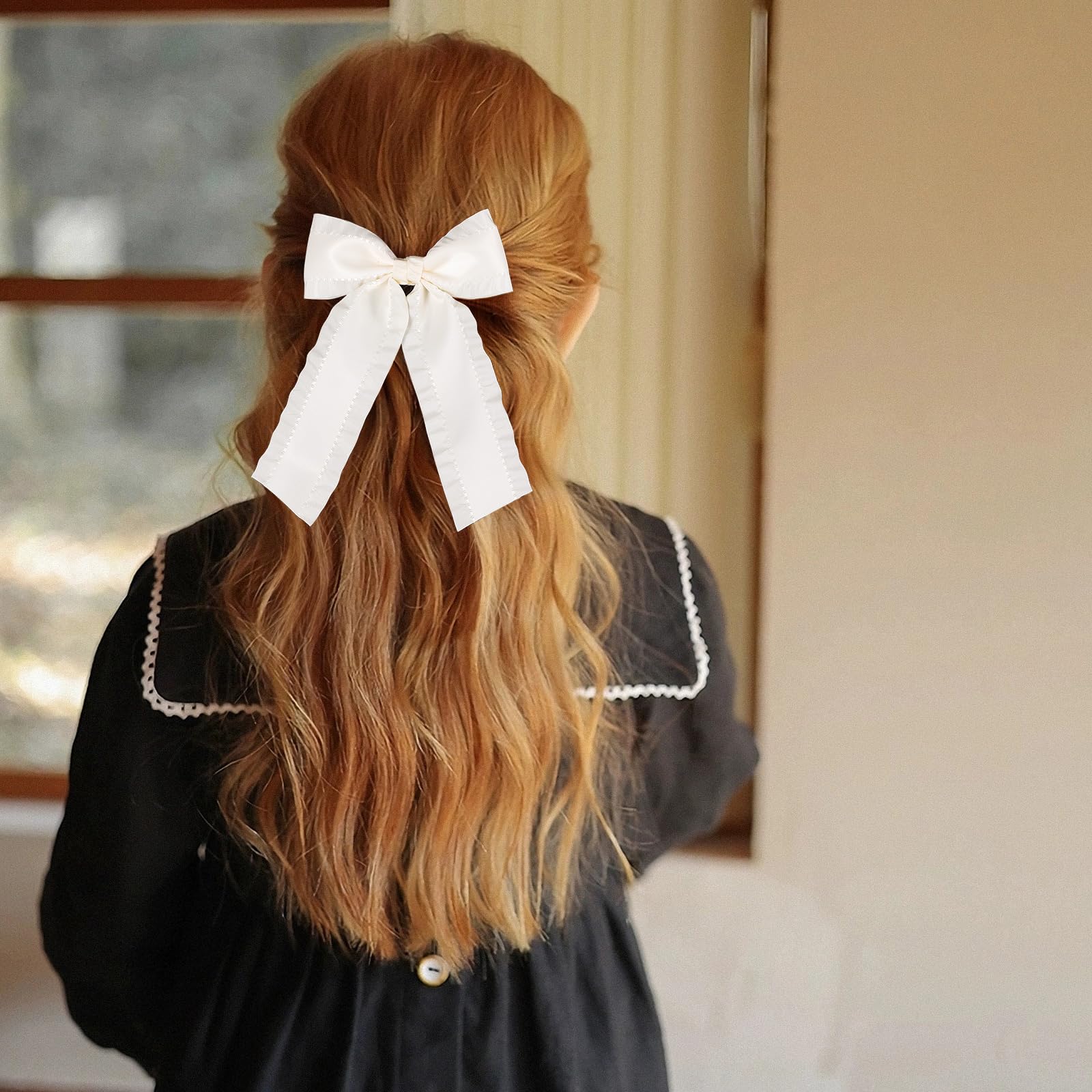 Miroksh bow clipped on ponytail adding instant polish and volume to hairstyle