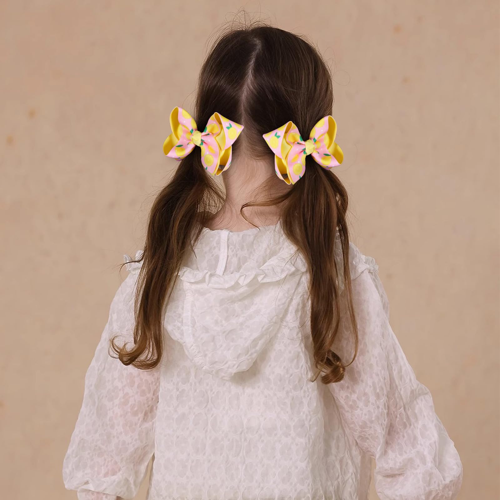Miroksh lemon bow worn on child offering playful summer styling
