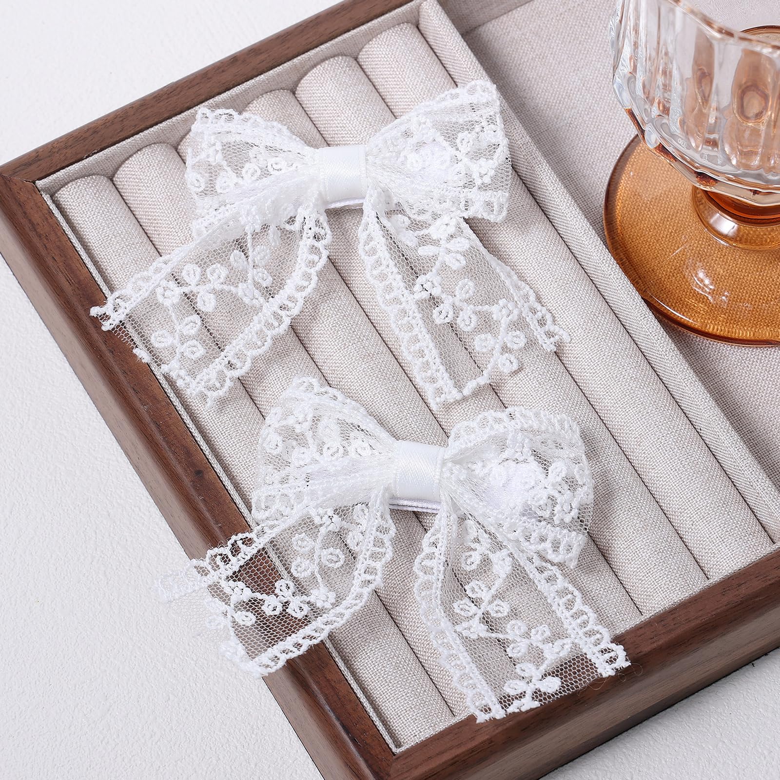Miroksh on adult bride near bouquet adding subtle bridal accent