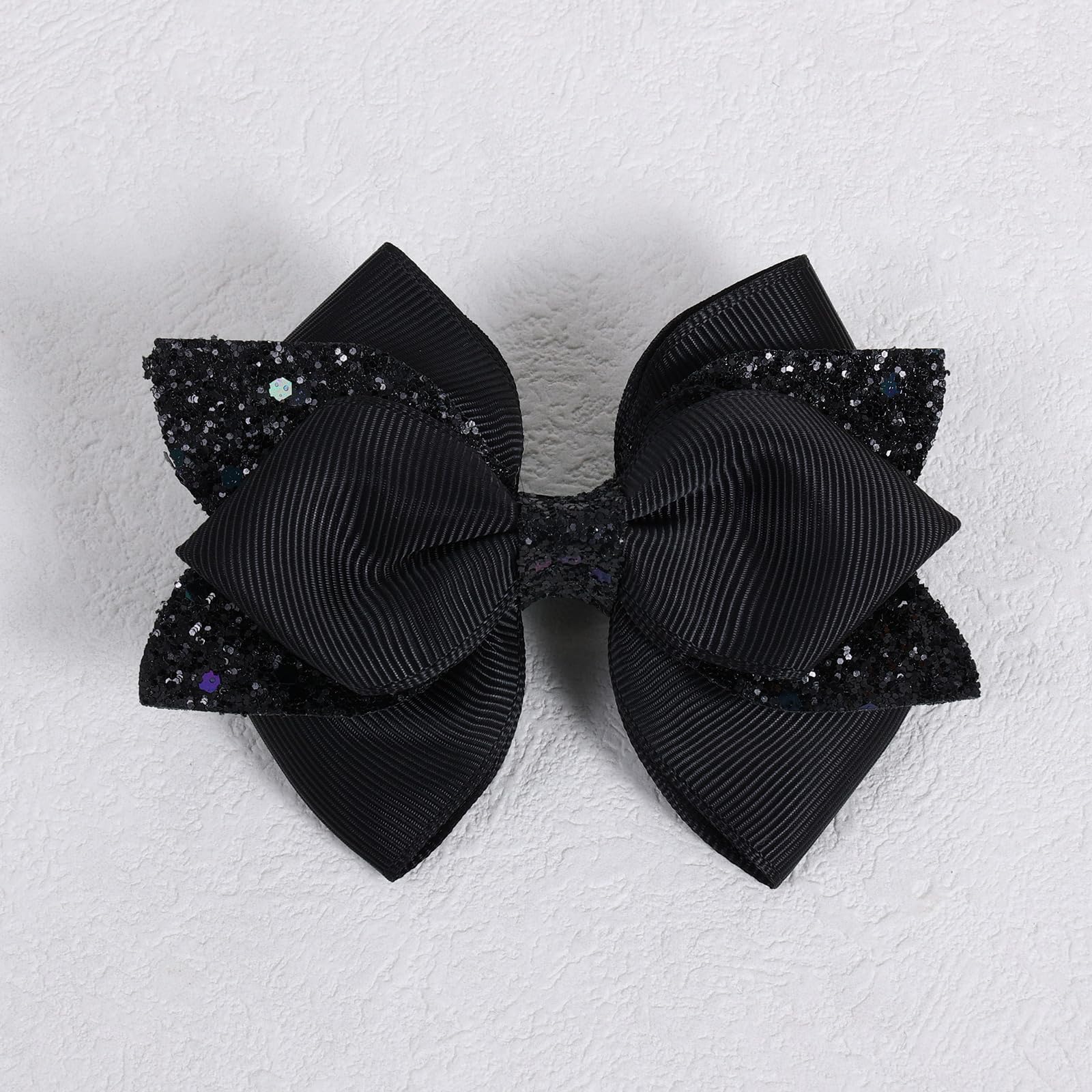 Miroksh paired bows worn with outfit illustrating coordinated accessory impact