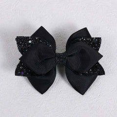 Miroksh paired bows worn with outfit illustrating coordinated accessory impact
