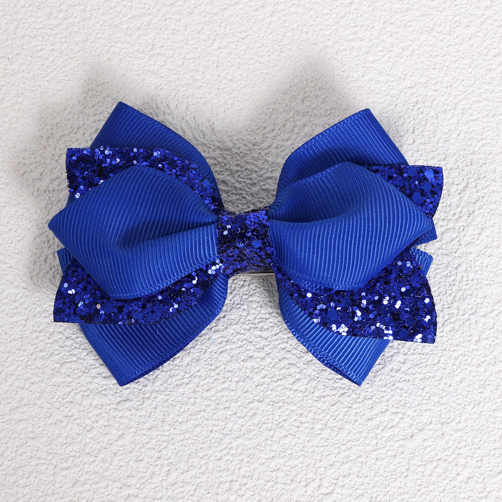 Miroksh bow styled on party dress illustrating festive accent and photo-ready shine