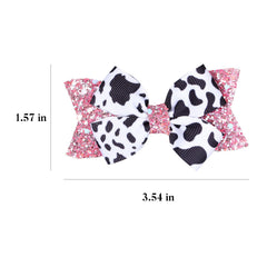 Miroksh bows styled in barnyard birthday scene showing themed party coordination