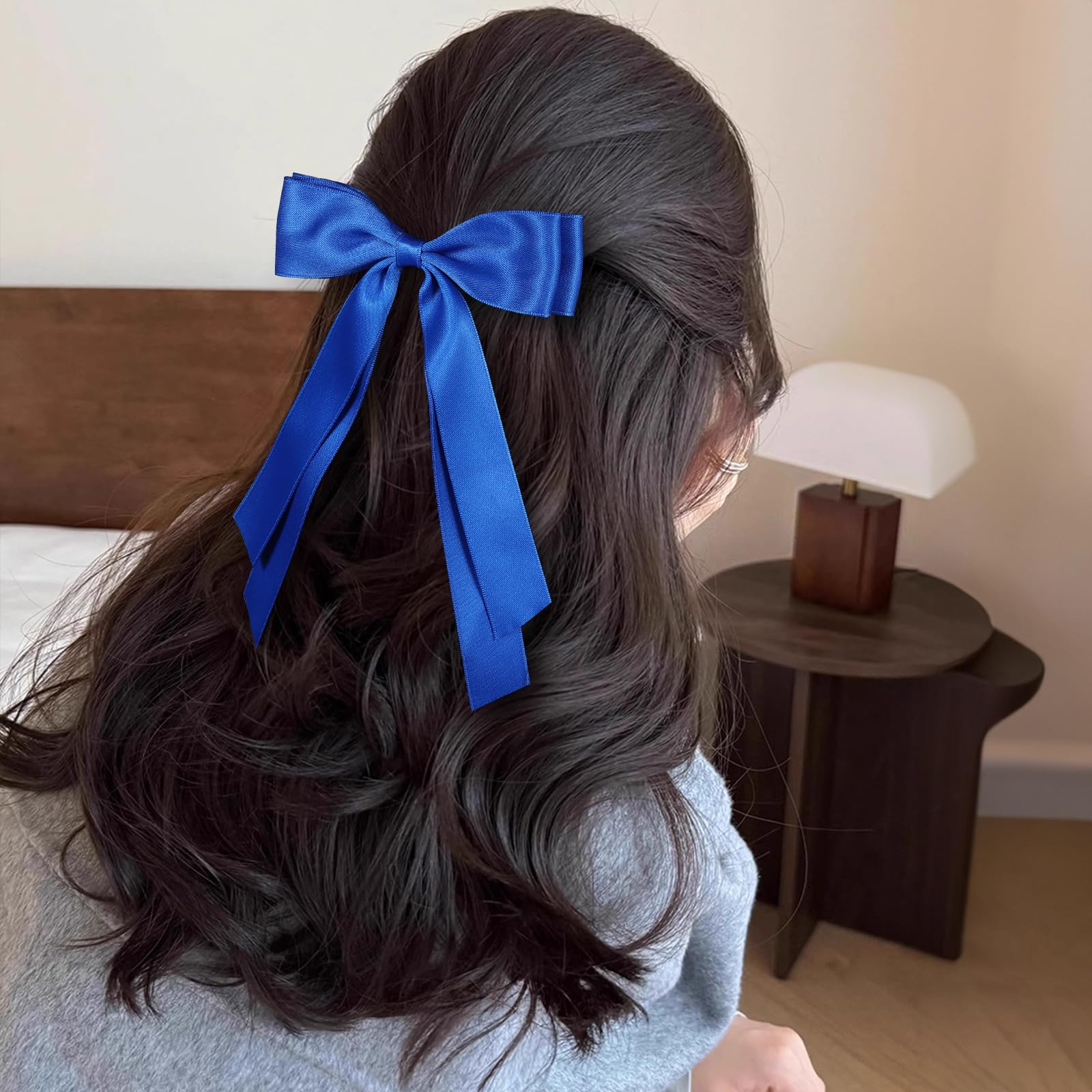 Miroksh bow worn on a ponytail demonstrating added length and movement