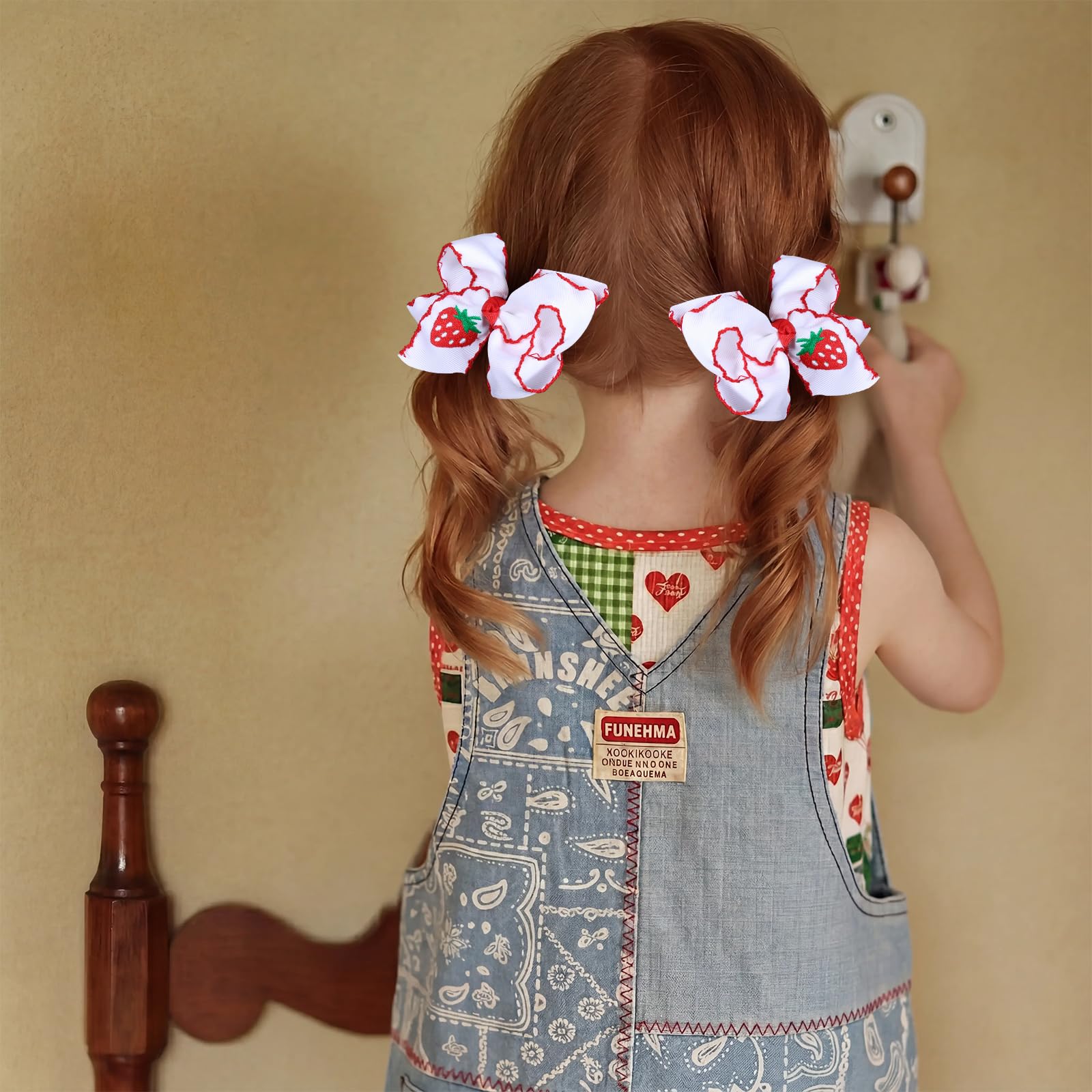 miroksh bow clipped in ponytail demonstrating visible accent and all-day hold