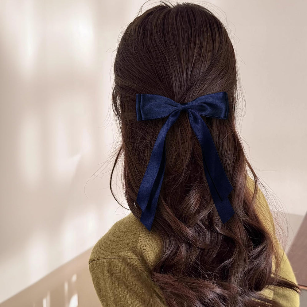 Miroksh bow worn in ponytail for polished everyday styling