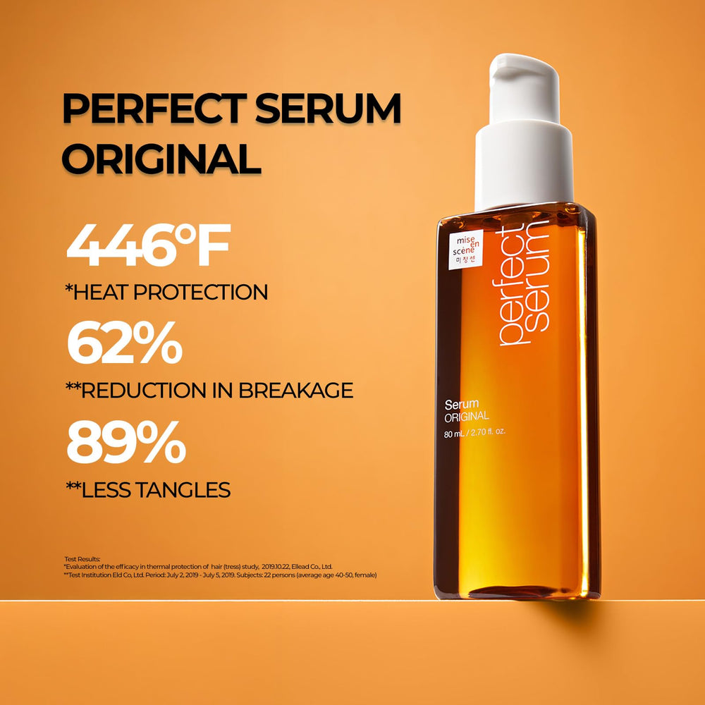 Applying Mise En Scene serum to hair ends to reduce frizz and visibly soften damaged tips
