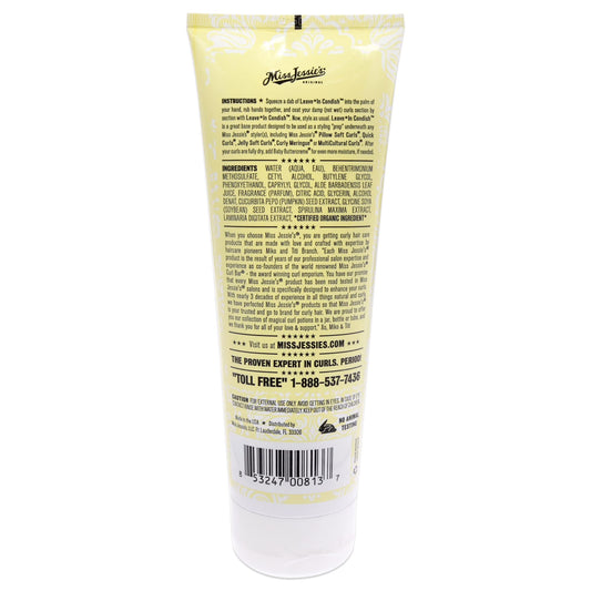 Miss Jessie's applying leave-in condish to wet curls for frizz control