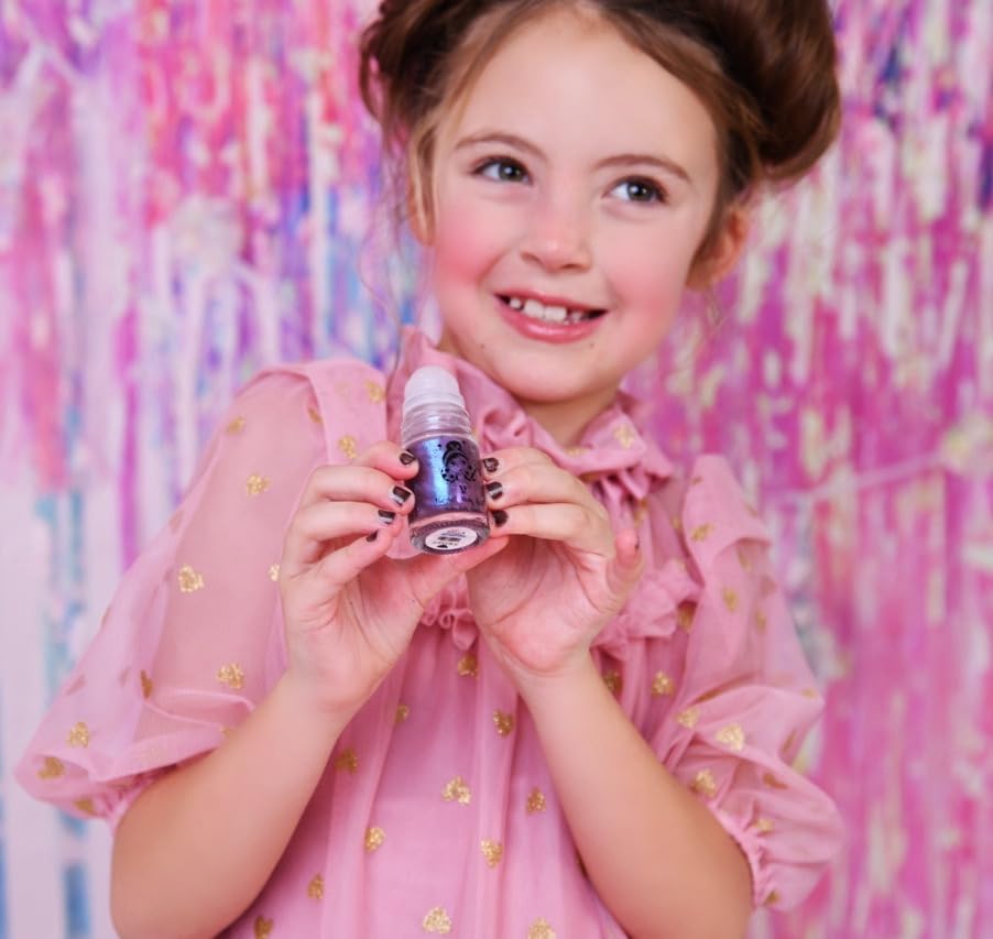 Miss Nella bottle in hand showing compact size and travel-friendly convenience
