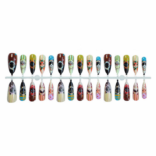 MISUD close-up of cartoon cat design on stiletto nail, highlights playful detail