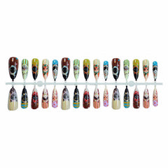 MISUD close-up of cartoon cat design on stiletto nail, highlights playful detail