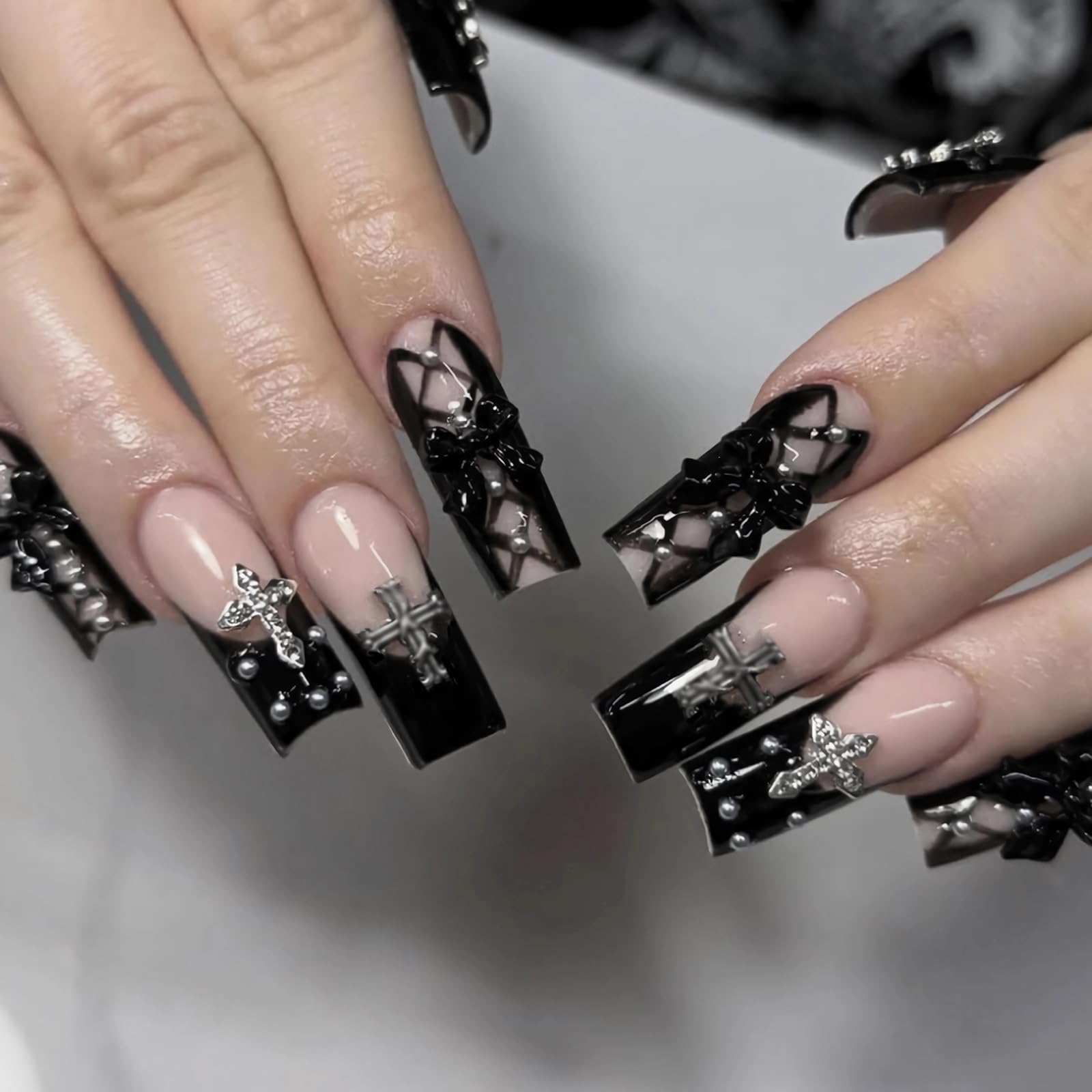 MISUD front packaging showing 24-piece gothic nail set and glue, clear appeal