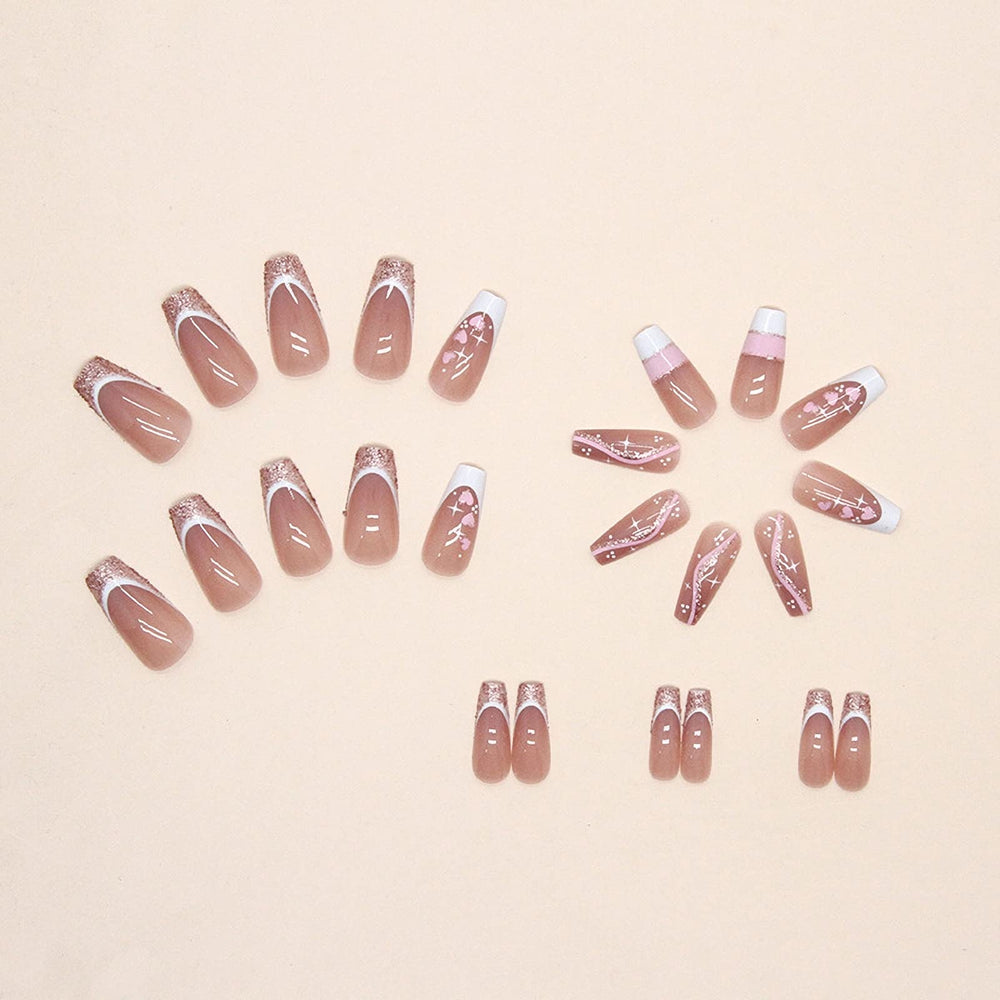 MISUD nails displayed on hand for scale, demonstrates long coffin fit