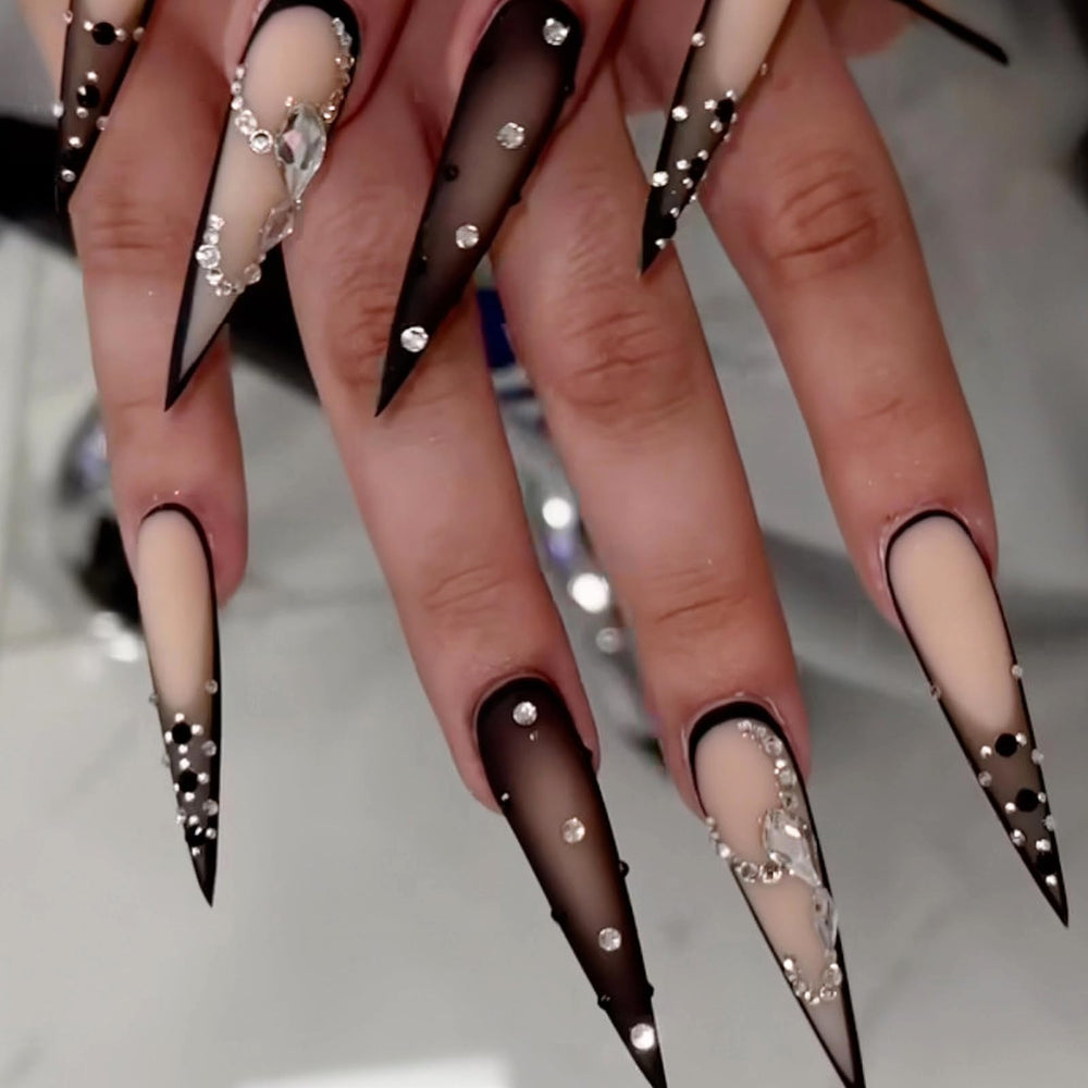 MISUD side profile of long stiletto nail shape, demonstrates dramatic length