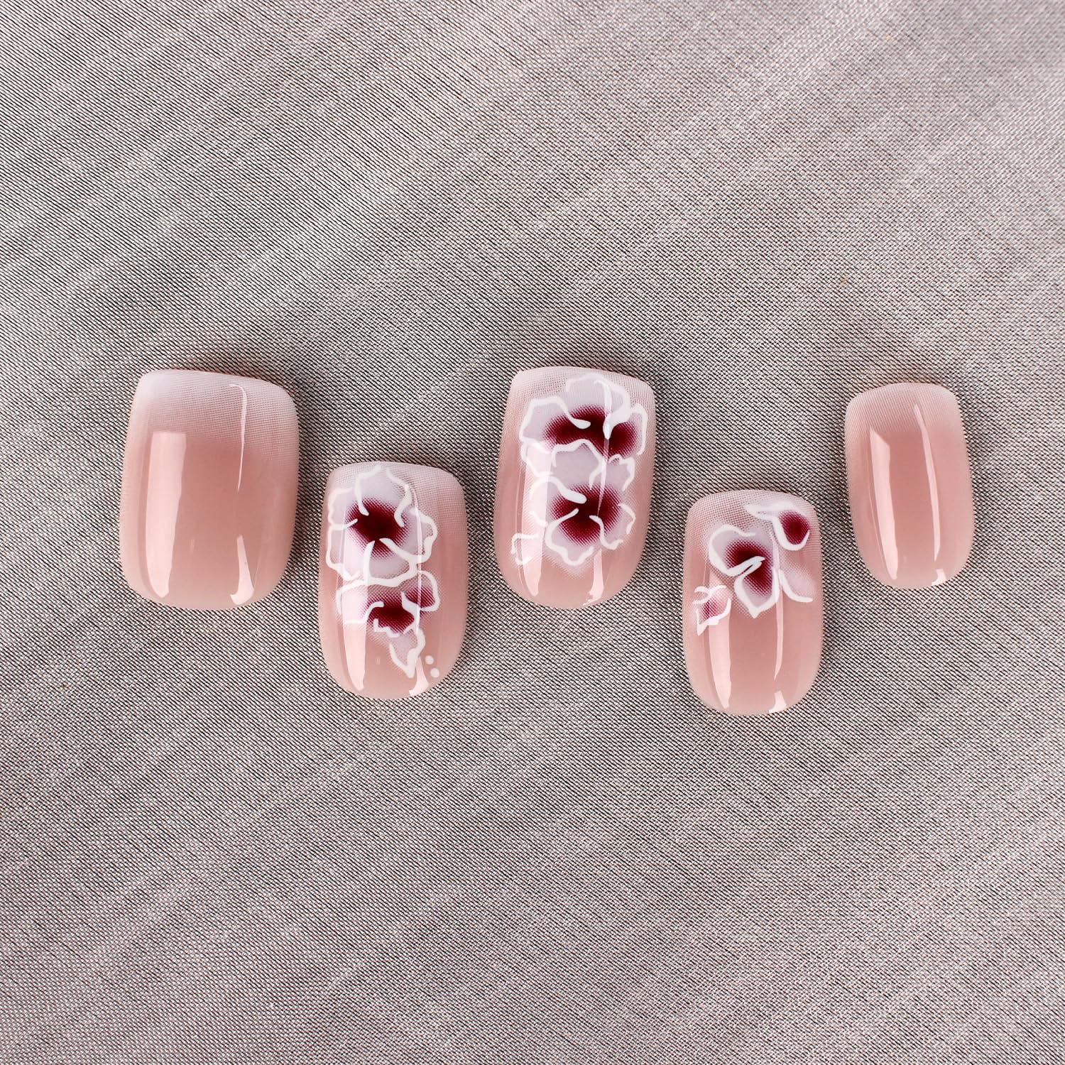 Mivota close-up of white-nude gradient and white silver flower detail, elegant finish