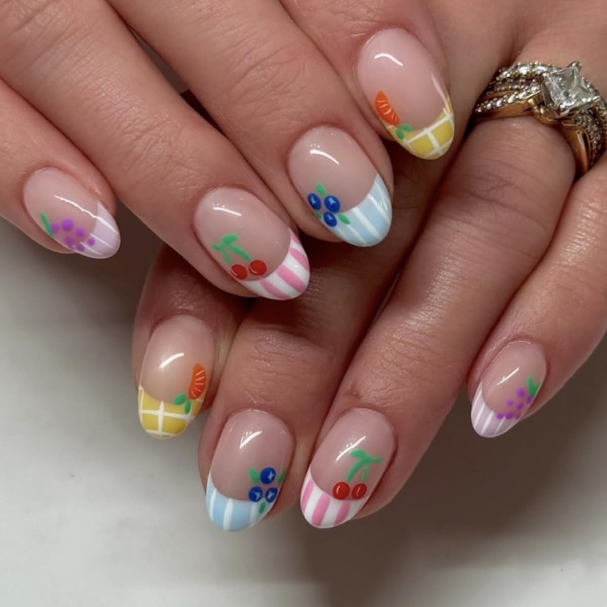 Mivota front packaging showing 24-piece fruit press-on nails for quick polish