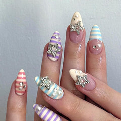 Mivota front packaging showing colorful stripe nails and included tools for quick styling