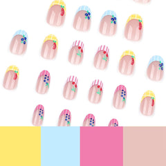 Mivota nails worn on hand paired with summer outfit for seasonal flair