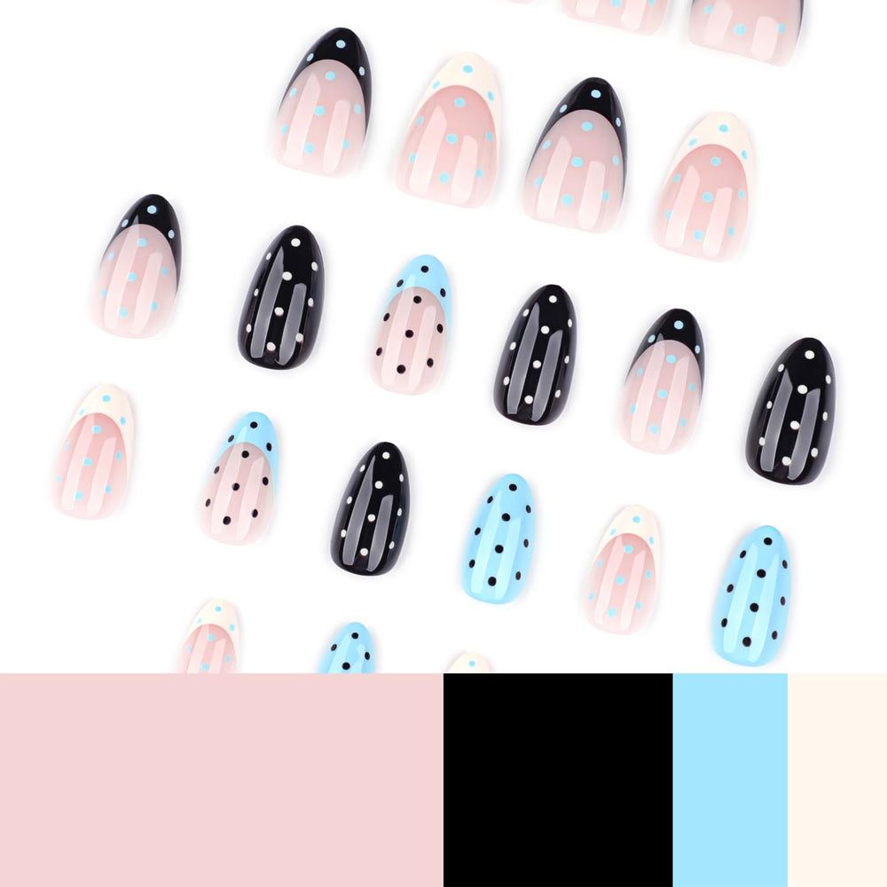 Mivota nails worn on hand showcasing nude and blue polka dot aesthetic