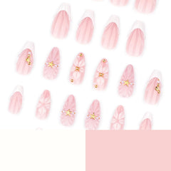 Mivota nails worn on hands at the beach conveying a polished summer look