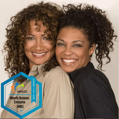 Mixed Chicks close-up curl strand showing glossy, fortified hair