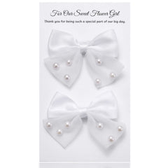 MIXJOY front view of two white pearl bow clips, elegant gift ready
