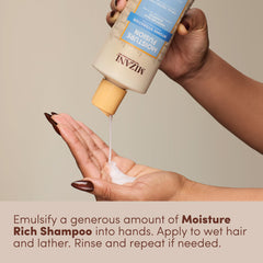Mizani bottle in hand for size comparison and travel convenience