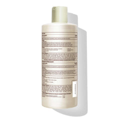 Mizani 16.9 fl oz next to common bottle showing true size and value benefit