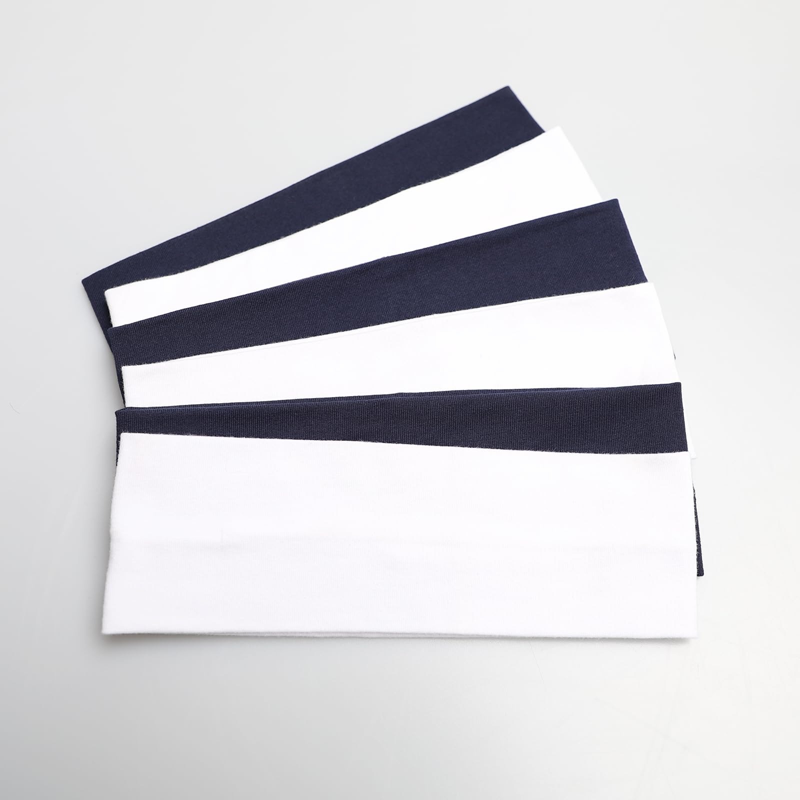MLMOMVME headband next to ruler showing width and stretch measurement
