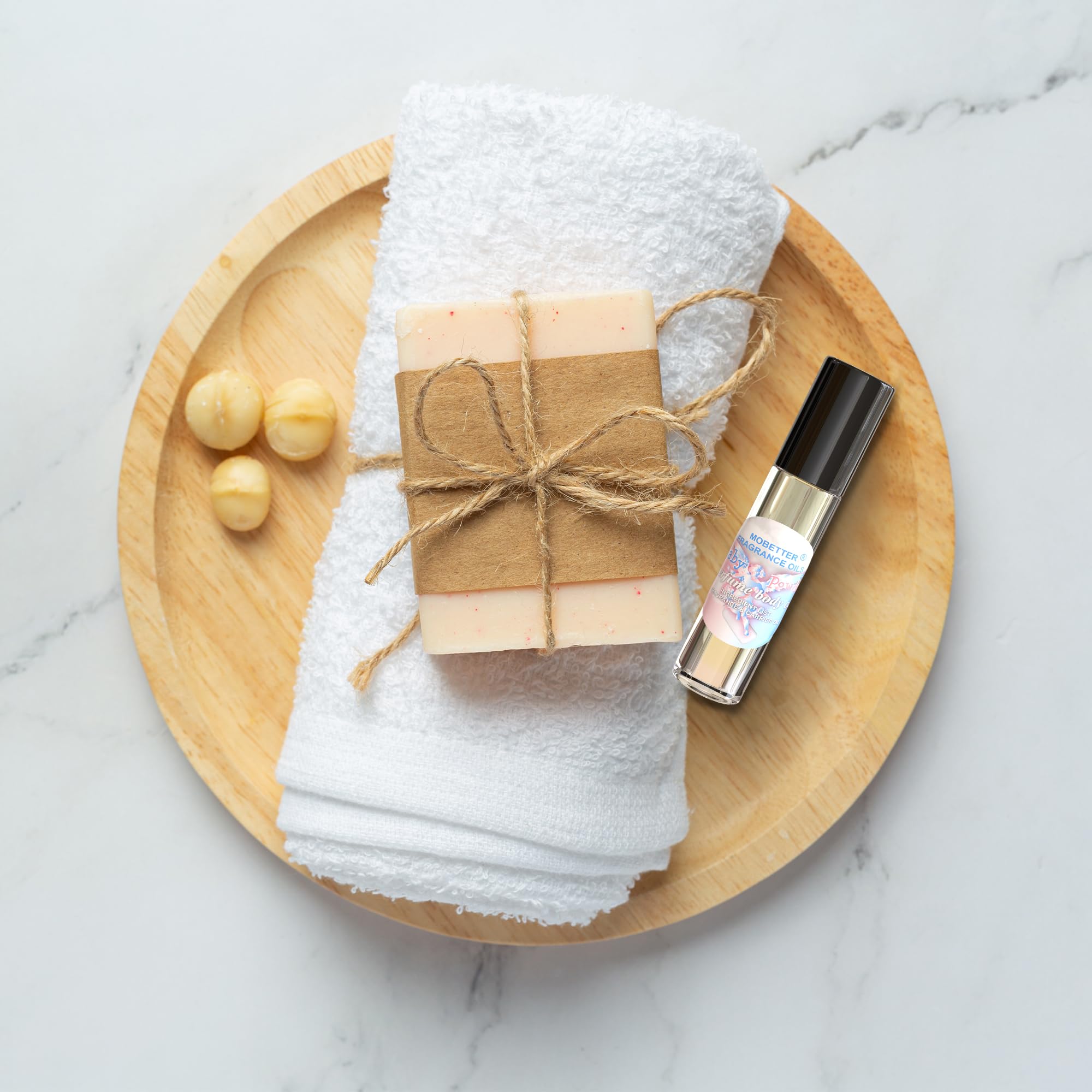 MOBETTER FRAGRANCE OILS bottle in hand demonstrating travel-friendly compact scale