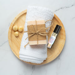 MOBETTER FRAGRANCE OILS bottle in hand demonstrating travel-friendly compact scale