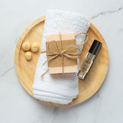MOBETTER FRAGRANCE OILS applying roll-on to wrist demonstrating targeted, long-lasting scent