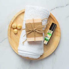 MOBETTER FRAGRANCE OILS held in hand to show compact travel size and easy portability