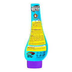 Moco de Gorila bottle in hand showing squeezable size for travel and convenience