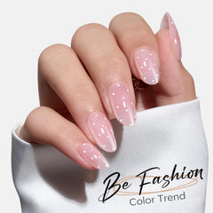 modelones hand demonstrating application to show easy pop-on benefit and quick manicure