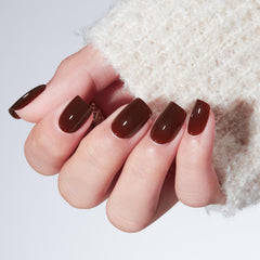 modelones close-up of semi-transparent brown nail texture and polished look