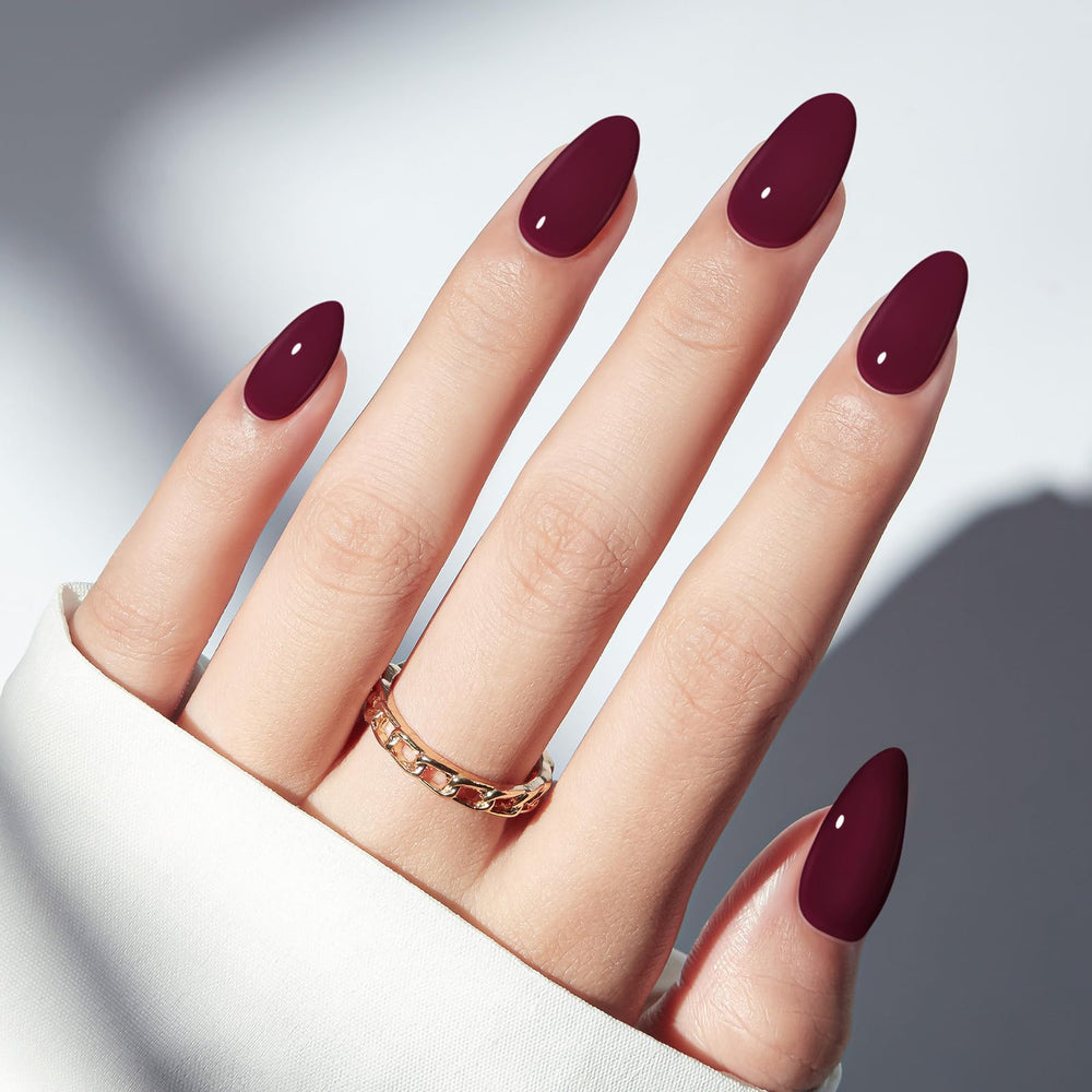 Modelones front packaging showing burgundy almond press-on nails and kit contents for convenience