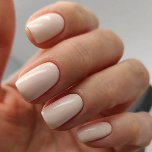 modelones close-up of white-pink nail texture highlighting smooth finish