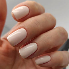 modelones close-up of white-pink nail texture highlighting smooth finish