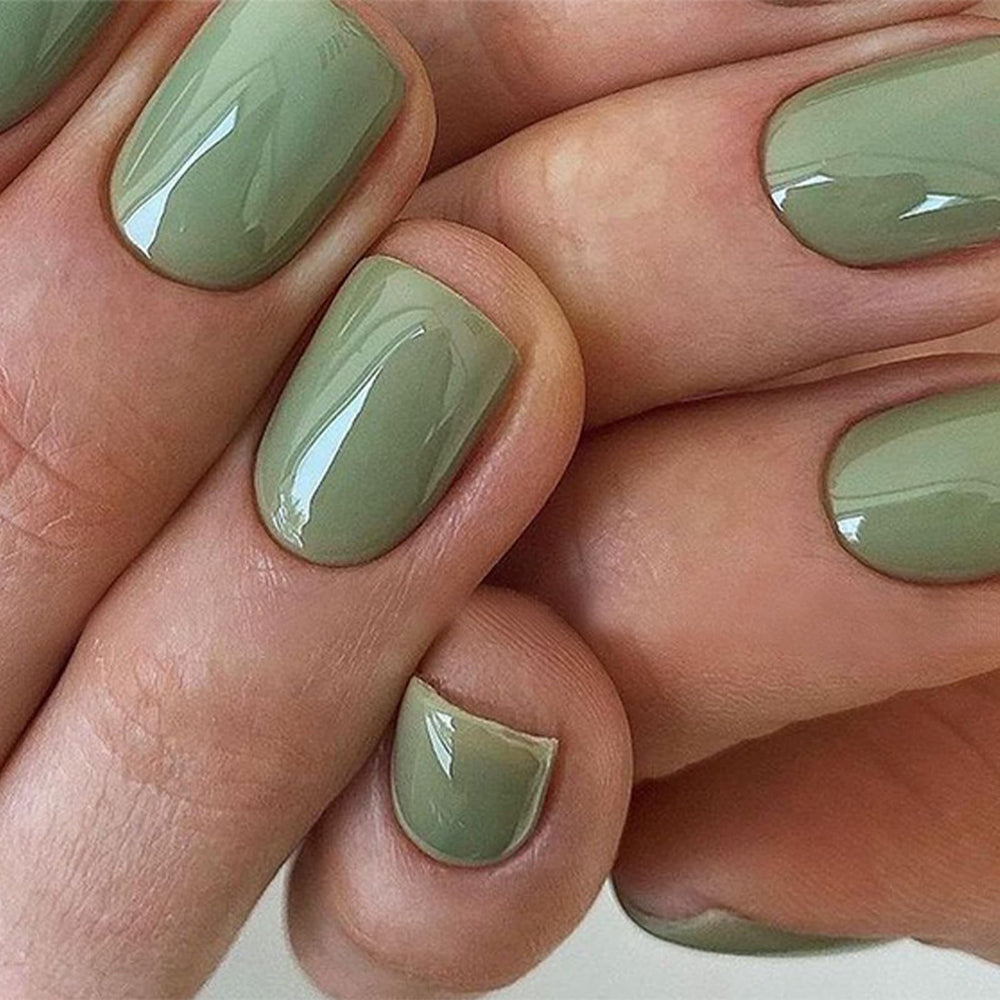 modelones close-up of green nail surface highlighting finish