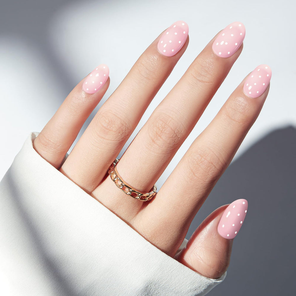 Modelones closeup of pink polka dot pattern highlighting design detail