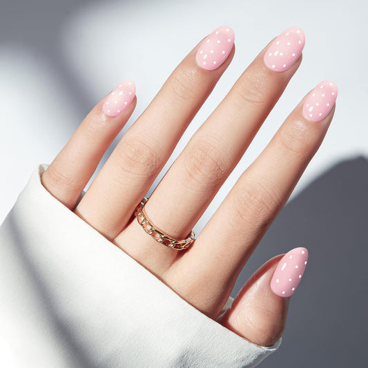Modelones closeup of pink polka dot pattern highlighting design detail
