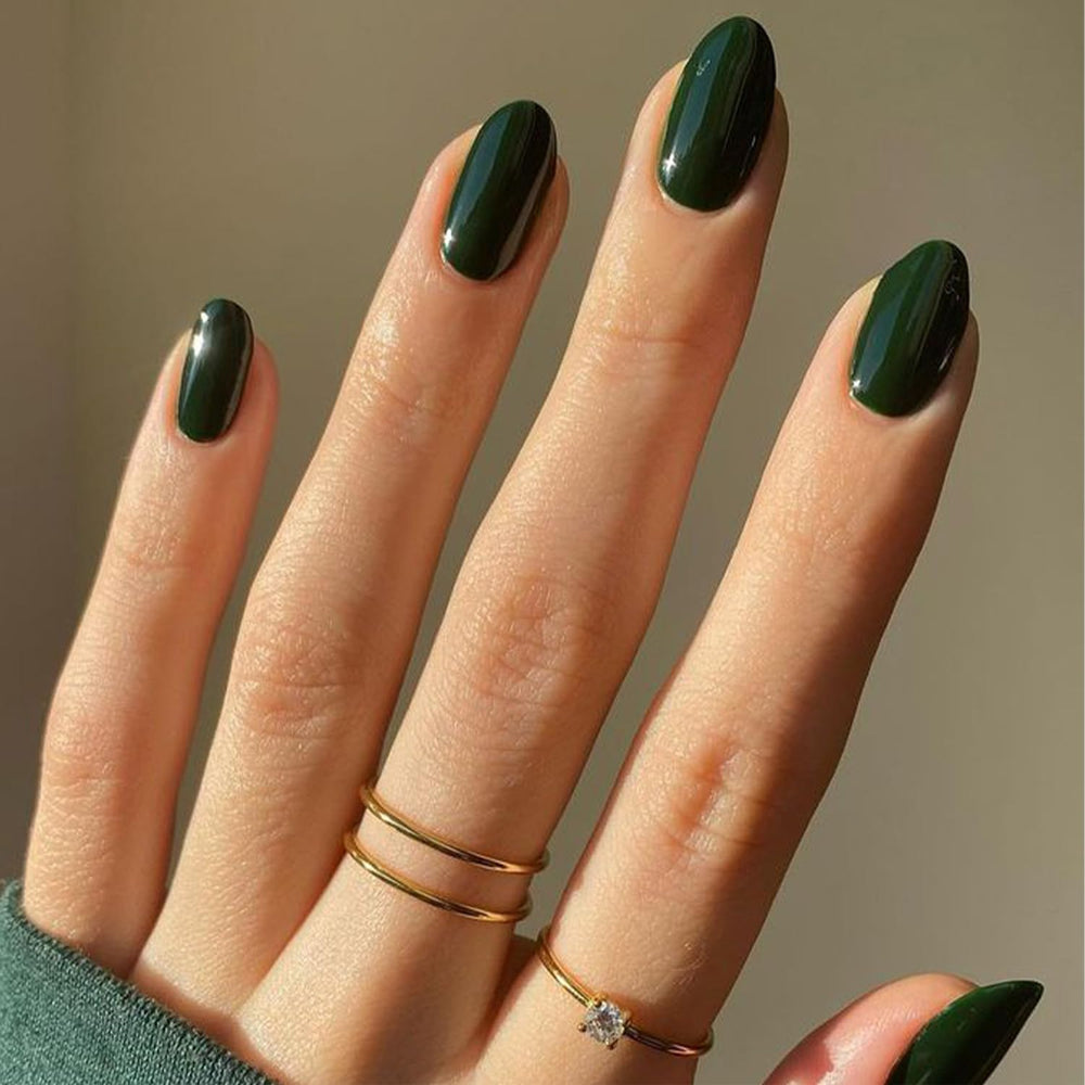 modelones front packaging showing dark green almond nails and kit contents for easy styling