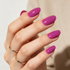 Modelones front packaging showing 32-piece almond fuchsia set and benefits